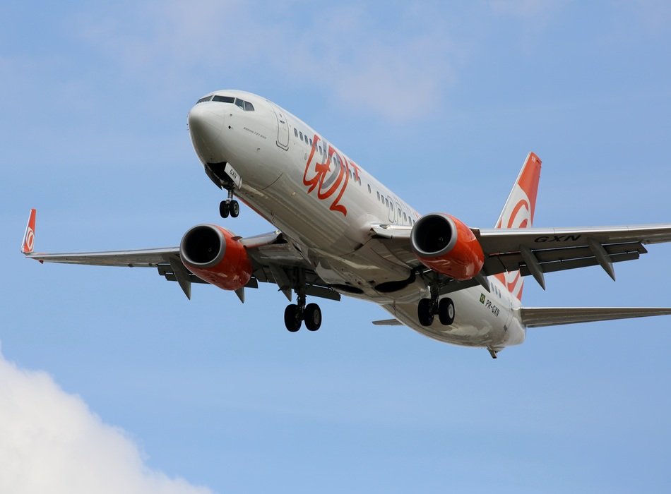 Commercial aircraft in the blue sky