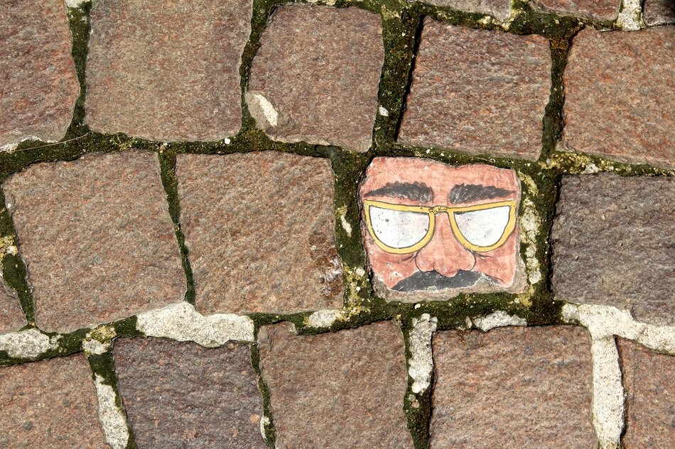 Painting on a Paving Stone