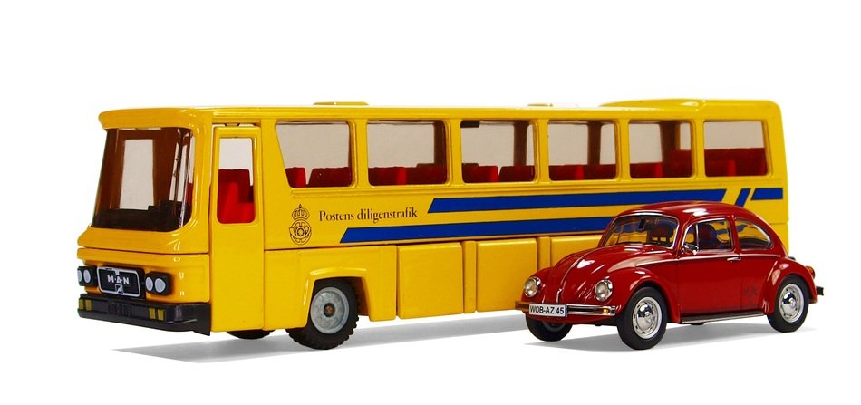 Model red Car and yellow bus