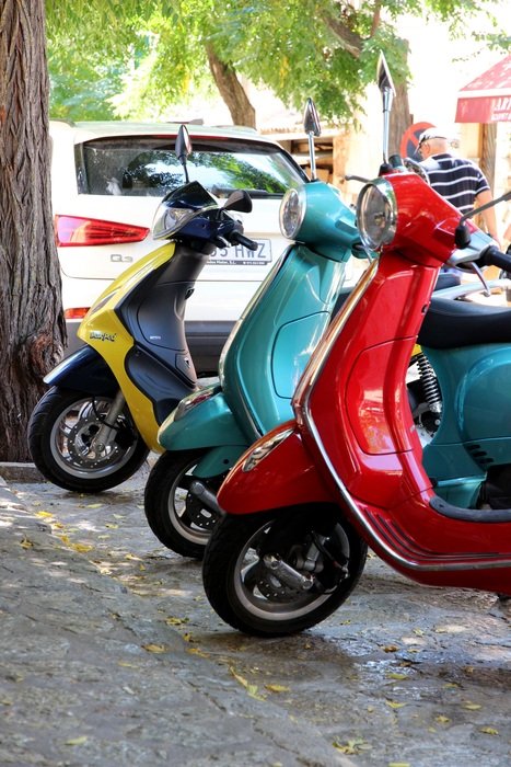 colorful Retro Motor Scooters in Park