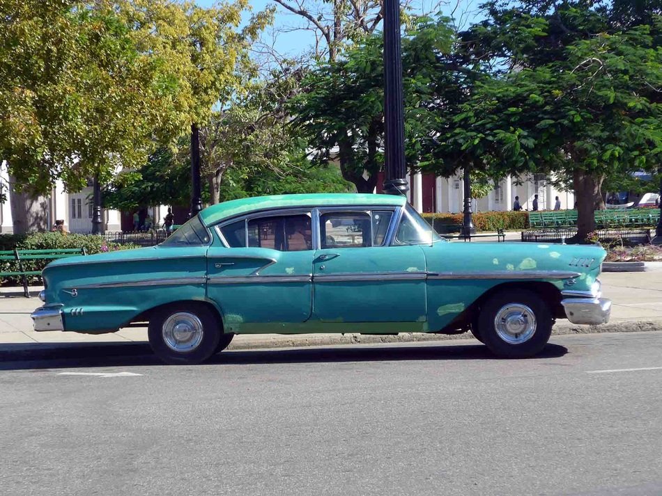Blue american car in a cube