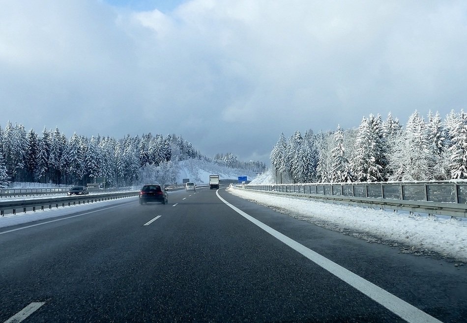 cars on the highway in winter