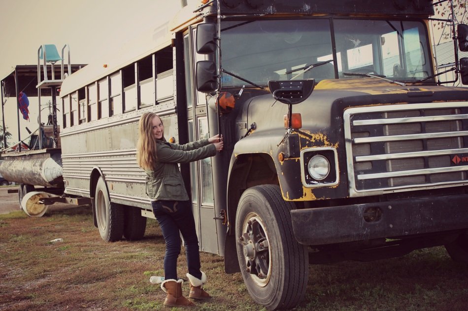 Woman near the old retro bus