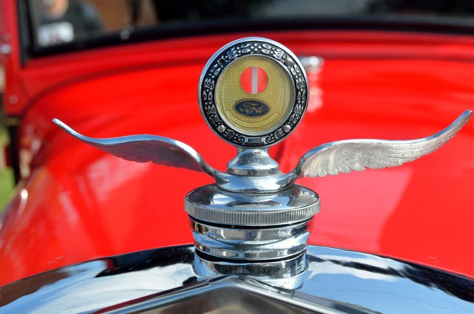 stylish design on the hood of a vintage car close-up