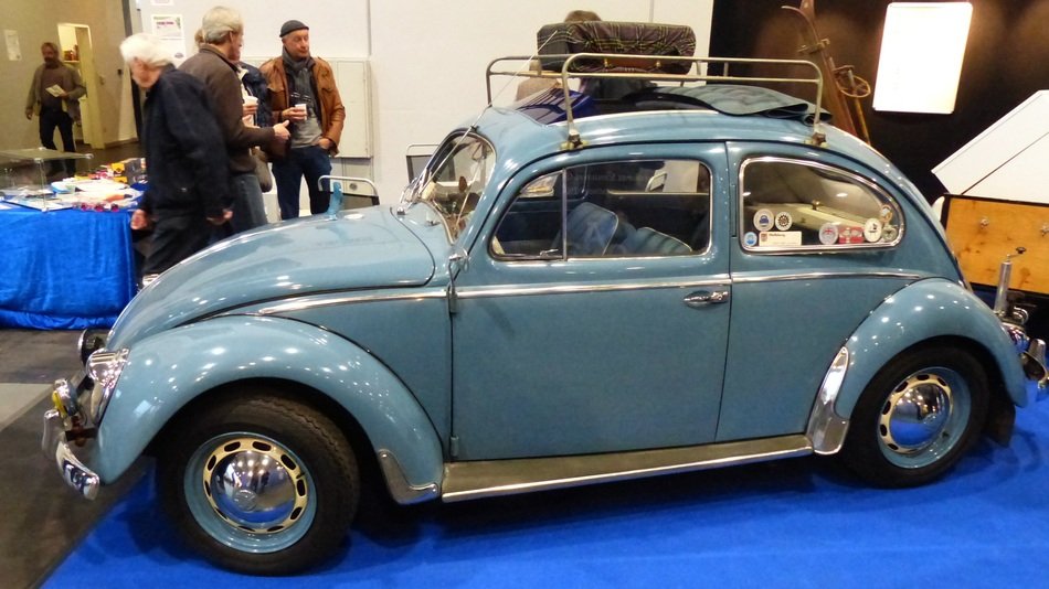 blue Volkswagen beetle on a exhibition
