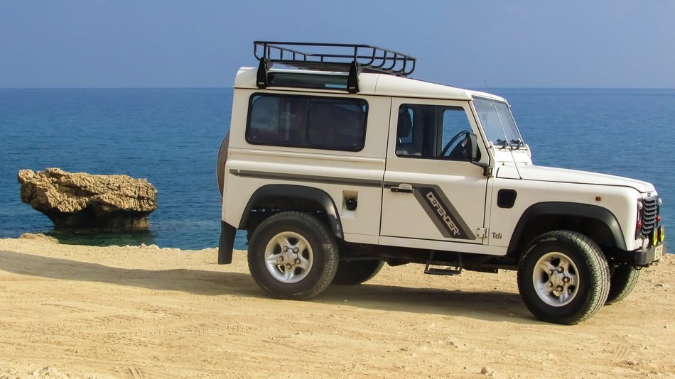 Land Rover Defender on the beach