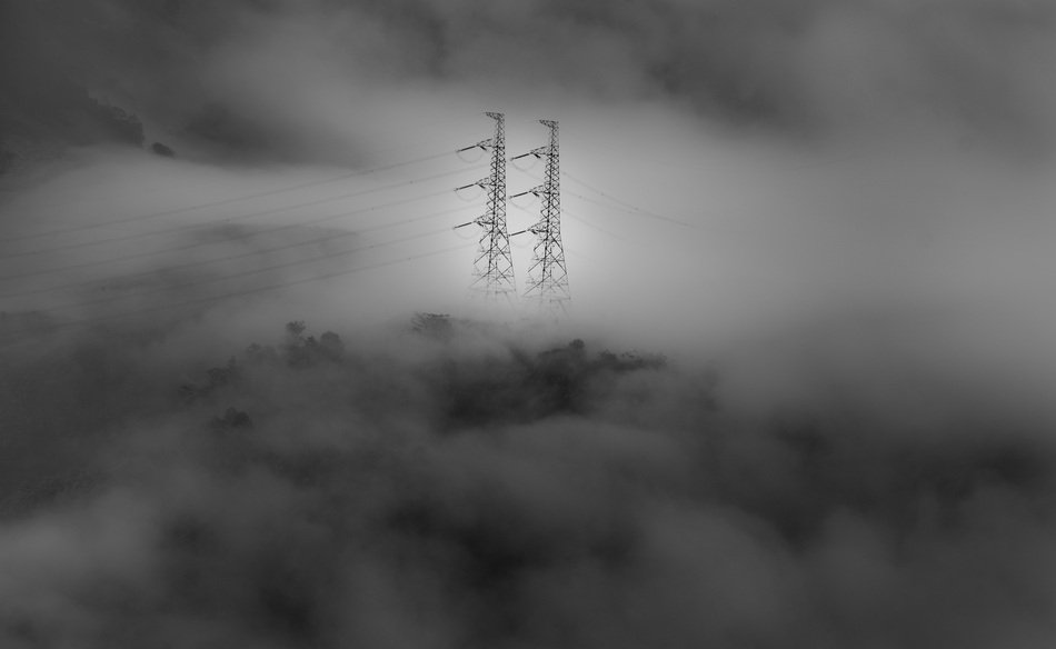 electric pillars in the fog in vietnam