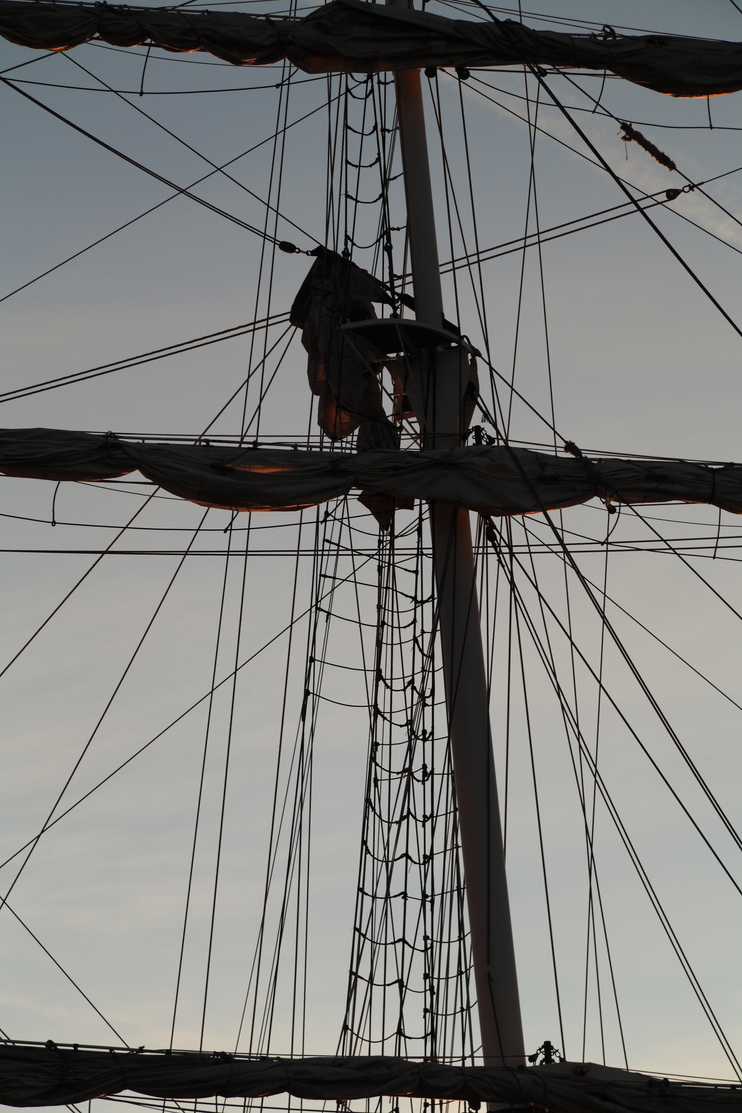 Man on the mast of the sailboat free image download