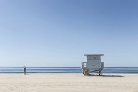 lifeguard tower on a sandy beach in california