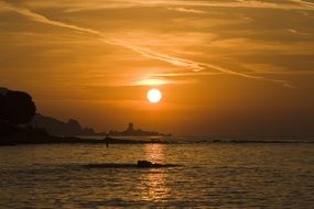 sunset above the horizon