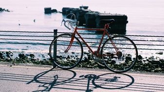 Bike on the sunny landscape with the water