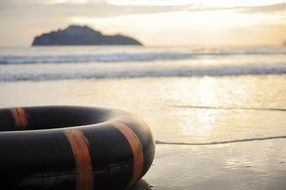 a circle on the beach by the sea