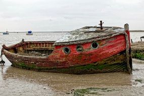 rotten fishing boat on the ocean