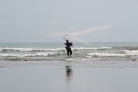 man on the surf on a cloudy day in bali