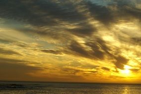 landscape of sun in the sky with clouds during sunset
