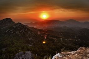 sunset over the mountains in greece