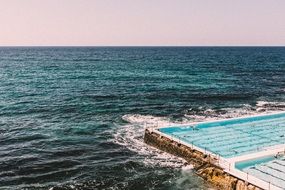 white pool near the ocean