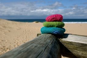 colorful yarn on the beach