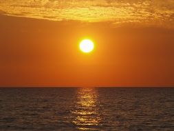 bright orange sunset on the ocean