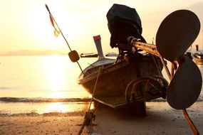 boat on the beach in the evening