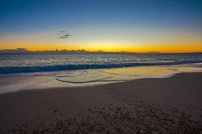 Beautiful landscape with the beach under the sunset in England