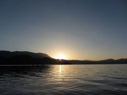 bright morning sun over a chinese lake