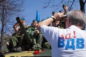 photo of russian soldiers on the tank