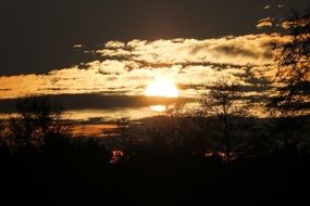 sunlight through the clouds at sunset