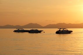 boats at dusk off the coast of mallorca