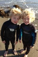 twin brothers on the beach
