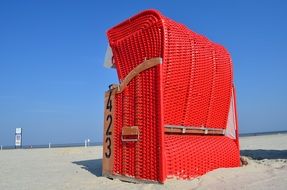 wicker beach cabin on a sunny beach