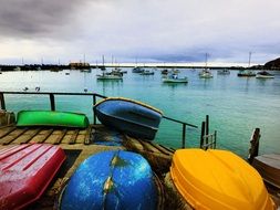 Colorful Boats in the harbor on the coast on a cloudy day