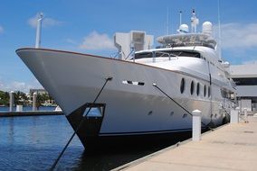 superyacht near the pier