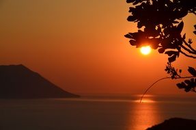 sunset view from milos island in greece