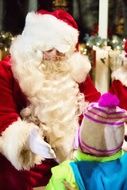 Santa Claus and child