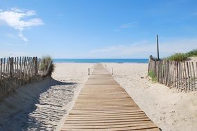 wooden beach path to montpelier