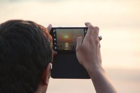 snapshot of the sunset on the phone