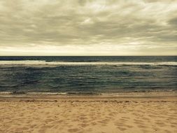 clouds over a sandy beach