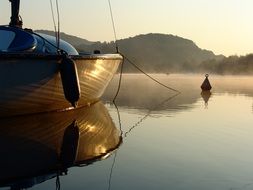 boat on the pier in the morning haze