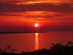 red sunset over the coast of croatia