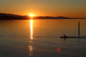 canoe at sunset in vancouver