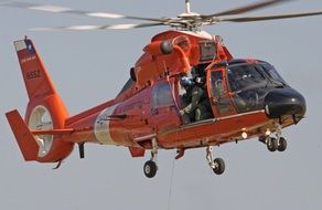 Mh-65 Dolphin helicopter in the air