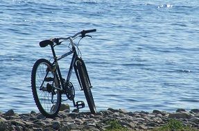 cyclist on a rocky coast