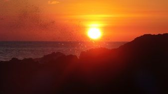 Landscape of the cliffs on a shore at the sunset