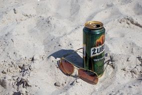 Sunglasses and Beer on Beach