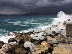 large stones on the coast in stormy weather