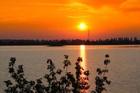 bright sunset sun reflected in the water