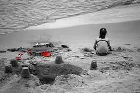 Black and white photo of the girl on the beach