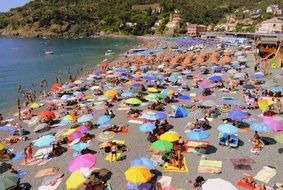 Sea Umbrellas beach tourists