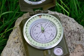 compass on a big stone